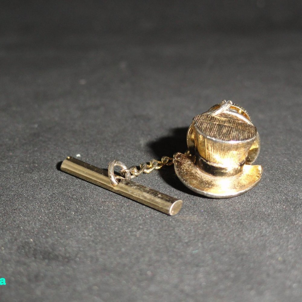 Four Tie Tack and a Pair of Links